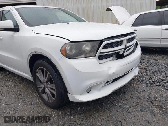 2013 Dodge Durango R/T with VIN 1C4SDHCT6DC672487, listed as a IAAI auction lot 42242172 with 185,074 mi miles and . Bid and sale history available at DreamBid. Image 17.