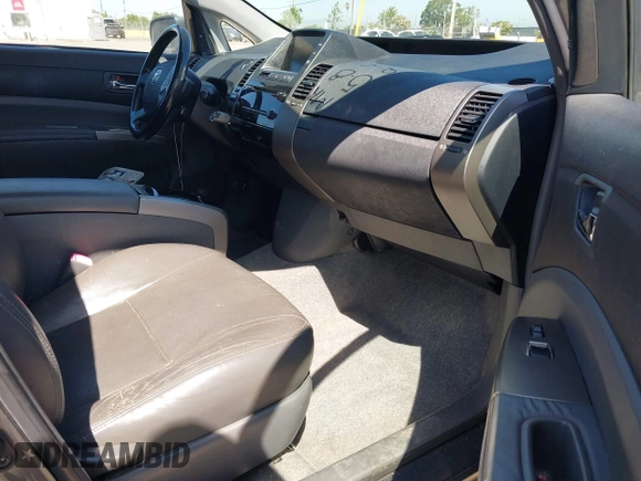 2007 Toyota Prius z VIN JTDKB20UX73217307, wystawiony jako IAAI lot #42225740 z przebiegiem 196 251 mil mil oraz . Historia ofert i sprzedaży dostępna na DreamBid. Obrazek 5.