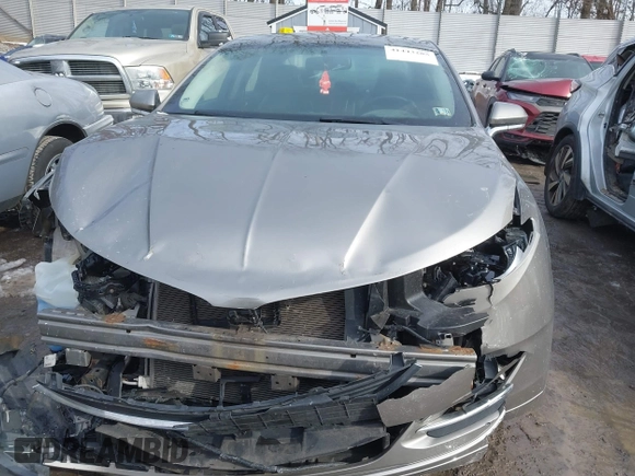 2015 Lincoln MKZ z VIN 3LN6L2JK4FR610596, wystawiony jako IAAI lot #41443285 z przebiegiem 114 363 mil mil oraz . Historia ofert i sprzedaży dostępna na DreamBid. Obrazek 12.