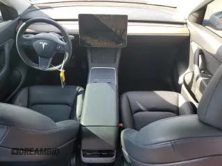 2022 Tesla Model Y Long Range with VIN 7SAYGAEE6NF506405, listed as a Copart auction lot 50392655 with 36,866 mi miles and Salvage Title. Bid and sale history available at DreamBid. Image 8.