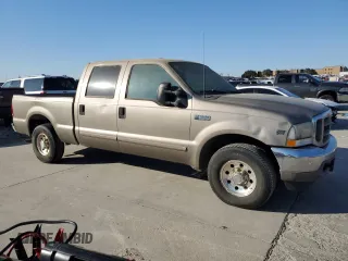 2002 Ford F-250 XL with VIN 1FTNW20S12EA04551, listed as a Copart auction lot 82785534 with 375,165 mi miles and Clean Title. Bid and sale history available at DreamBid. Image 4.