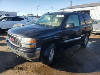 2005 GMC Yukon SLT with VIN 1GKEK13T05J107678, listed as a Copart auction lot 77447784 with 269,040 mi miles and Salvage Title. Bid and sale history available at carsss.com. Image 1.