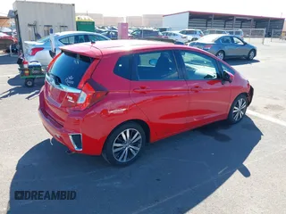 2015 Honda Fit EX-L z VIN 3HGGK5H84FM761279, wystawiony jako IAAI lot #40911141 z przebiegiem 82 217 mil mil oraz . Historia ofert i sprzedaży dostępna na DreamBid. Obrazek 4.