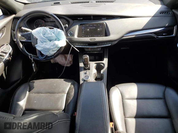 2021 Cadillac XT4 AWD Luxury with VIN 1GYFZBR48MF034573, listed as a Copart auction lot 51114315 with 53,066 mi miles and Salvage title. Bid and sale history available at DreamBid. Image 8.