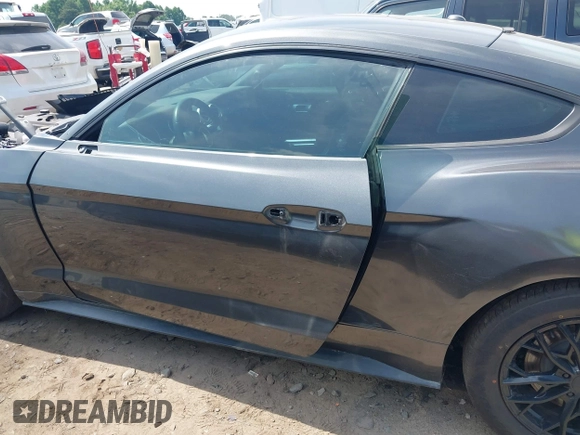 2019 Ford Mustang EcoBoost z VIN 1FA6P8TH0K5199276, wystawiony jako IAAI lot #42491713 z przebiegiem 135 710 mil mil oraz . Historia ofert i sprzedaży dostępna na DreamBid. Obrazek 15.