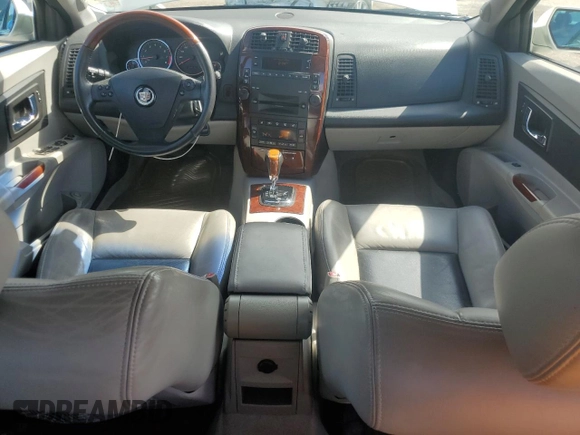 2006 Cadillac CTS with VIN 1G6DP577460126144, listed as a Copart auction lot 73348774 with 104,916 mi miles and Salvage Title. Bid and sale history available at carsss.com. Image 8.