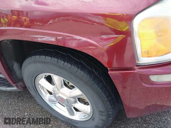 2003 GMC Envoy SLE z VIN 1GKDT13S732389048, wystawiony jako IAAI lot #42414696 z przebiegiem 215 253 mil mil oraz . Historia ofert i sprzedaży dostępna na DreamBid. Obrazek 6.