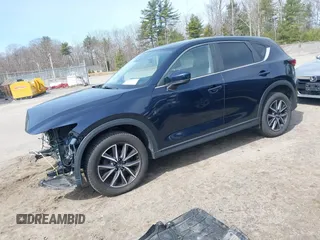 2018 Mazda CX-5 Touring z VIN JM3KFBCM4J0379871, wystawiony jako IAAI lot #41865130 z przebiegiem 48 674 mil mil oraz . Historia ofert i sprzedaży dostępna na DreamBid. Obrazek 18.