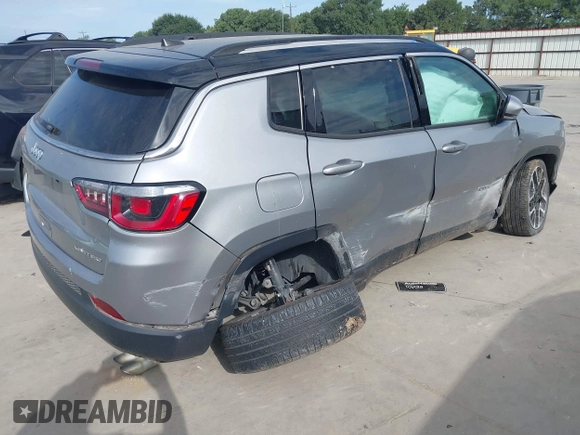 2018 Jeep Compass Limited with VIN 3C4NJCCBXJT499864, listed as a IAAI auction lot 42319832 with 94,893 mi miles and . Bid and sale history available at DreamBid. Image 4.