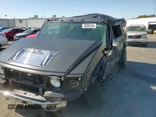 2003 Hummer H2 with VIN 5GRGN23U83H134284, listed as a Copart auction lot 70259154 with 0 mi miles and Salvage Title. Bid and sale history available at carsss.com. Image 12.