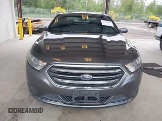2016 Ford Taurus Limited z VIN 1FAHP2F84GG141829, wystawiony jako IAAI lot #42179934 z przebiegiem 144 191 mil mil oraz . Historia ofert i sprzedaży dostępna na DreamBid. Obrazek 13.