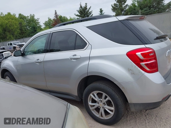 2016 Chevrolet Equinox LT z VIN 2GNALCEK9G1168510, wystawiony jako IAAI lot #42445901 z przebiegiem 165 031 mil mil oraz . Historia ofert i sprzedaży dostępna na DreamBid. Obrazek 14.