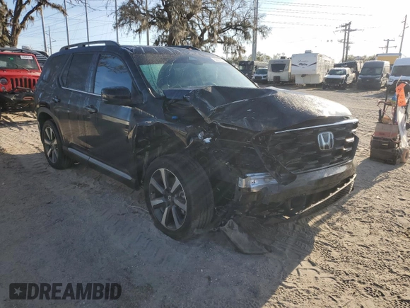 2023 Honda Pilot Touring with VIN 5FNYG2H77PB006594, listed as a Copart auction lot 83662854 with 37,637 mi miles and Salvage Title. Bid and sale history available at DreamBid. Image 4.