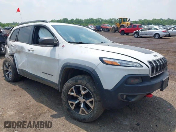 2017 Jeep Cherokee Trailhawk with VIN 1C4PJMBSXHW657446, listed as a IAAI auction lot 42406437 with 158,351 mi miles and . Bid and sale history available at DreamBid. Image 1.