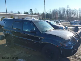 2002 Ford Escape Limited with VIN 1FMCU041X2KC74197, listed as a IAAI auction lot 41363369 with 153,704 mi miles. Bid and sale history available at carsss.com. Image 1.