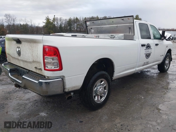 2022 Ram 2500 Tradesman with VIN 3C6UR5HL5NG377811, listed as a IAAI auction lot 41198331 with 104,892 mi miles. Bid and sale history available at carsss.com. Image 4.