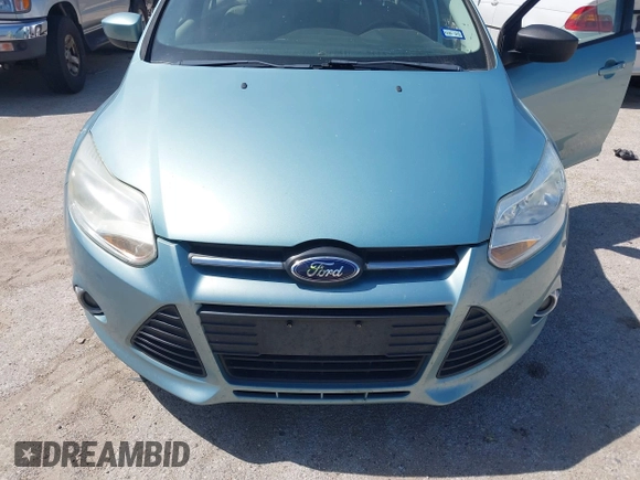 2012 Ford Focus SE z VIN 1FAHP3F22CL352952, wystawiony jako IAAI lot #42722671 z przebiegiem 126 923 mil mil oraz . Historia ofert i sprzedaży dostępna na DreamBid. Obrazek 6.