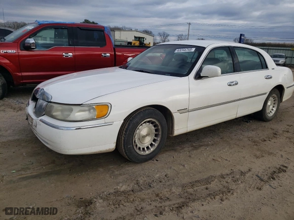 1998 Lincoln Town Car Executive with VIN 1LNFM81W7WY661143, listed as a Copart auction lot 43244755 with 115,992 mi miles and Salvage Title. Bid and sale history available at carsss.com. Image 1.
