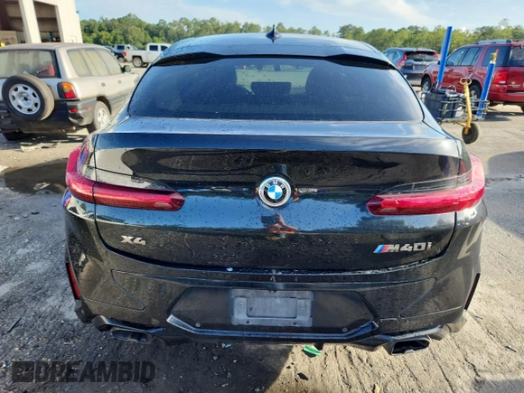 2021 BMW X4 M40i with VIN 5UX2V5C05M9F68427, listed as a Copart auction lot 64941095 with 50,208 mi miles and Salvage title. Bid and sale history available at DreamBid. Image 6.