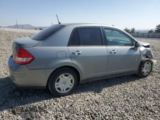 2010 Nissan Versa S with VIN 3N1BC1AP8AL457552, listed as a Copart auction lot 59703695 with 149,160 mi miles and Salvage title. Bid and sale history available at DreamBid. Image 3.