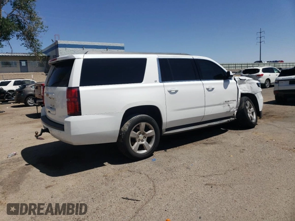 2015 Chevrolet Suburban LT z VIN 1GNSCJKC4FR549967, wystawiony jako Copart lot #57952955 z przebiegiem 311 163 mil mil oraz Szkoda całkowita • Salvage title. Historia ofert i sprzedaży dostępna na DreamBid. Obrazek 3.
