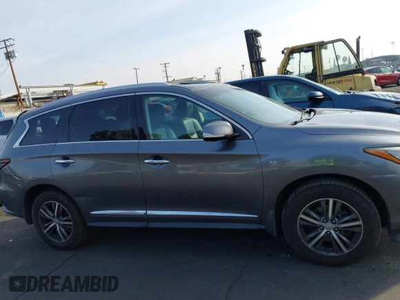 2016 Infiniti QX60 with VIN 5N1AL0MM4GC505861, listed as a IAAI auction lot 41366198 with 168,199 mi miles and . Bid and sale history available at DreamBid. Image 13.