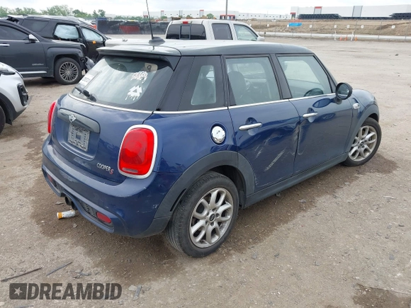 2017 MINI Hardtop 4 Door Cooper S z VIN WMWXU3C3XH2F49313, wystawiony jako IAAI lot #42137594 z przebiegiem 87 865 mil mil oraz . Historia ofert i sprzedaży dostępna na DreamBid. Obrazek 4.
