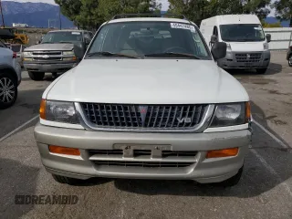 1999 Mitsubishi Montero Sport LS with VIN JA4LS31H2XP037110, listed as a Copart auction lot 45447485 with 166,942 mi miles and Salvage Title. Bid and sale history available at carsss.com. Image 5.