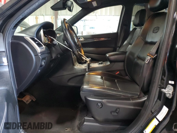 2014 Jeep Grand Cherokee Overland with VIN 1C4RJFCT9EC264594, listed as a Copart auction lot 50071695 with 124,712 mi miles and Clean Title. Bid and sale history available at DreamBid. Image 7.