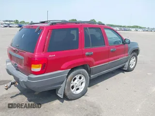 2001 Jeep Grand Cherokee Laredo with VIN 1J4GW48S81C727262, listed as a IAAI auction lot 42402470 with 228,167 mi miles and . Bid and sale history available at DreamBid. Image 4.
