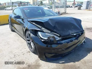 2022 Tesla Model S Plaid with VIN 5YJSA1E61NF483354, listed as a IAAI auction lot 41973636 with 32,541 mi miles and . Bid and sale history available at DreamBid. Image 6.