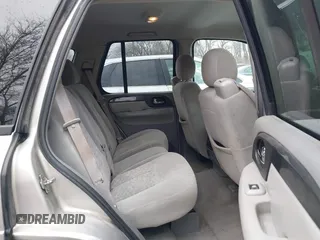 2005 GMC Envoy SLE with VIN 1GKDT13S552332088, listed as a IAAI auction lot 41699178 with 196,869 mi miles. Bid and sale history available at carsss.com. Image 8.