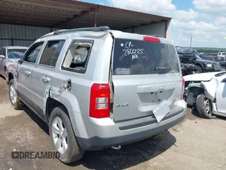 2014 Jeep Patriot Latitude with VIN 1C4NJRFB0ED549410, listed as a IAAI auction lot 42227402 with 139,908 mi miles and . Bid and sale history available at DreamBid. Image 3.