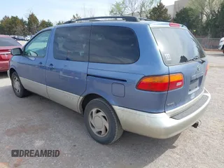 1999 Toyota Sienna LE with VIN 4T3ZF13C2XU147508, listed as a IAAI auction lot 41833859 with 275,682 mi miles. Bid and sale history available at carsss.com. Image 3.