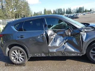 2019 Mazda CX-5 Grand Touring with VIN JM3KFBDM3K1677208, listed as a IAAI auction lot 41929299 with 58,163 mi miles. Bid and sale history available at carsss.com. Image 13.