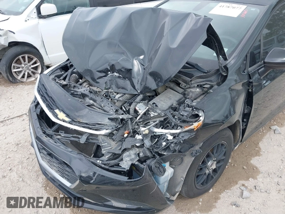 2018 Chevrolet Cruze LS with VIN 1G1BC5SM3J7210719, listed as a IAAI auction lot 41787077 with 93,489 mi miles and . Bid and sale history available at DreamBid. Image 6.