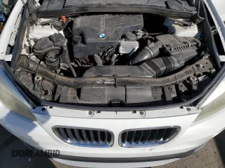 2014 BMW X1 xDrive28i with VIN WBAVL1C57EVR92896, listed as a Copart auction lot 47459295 with 140,935 mi miles and Clean Title. Bid and sale history available at carsss.com. Image 12.