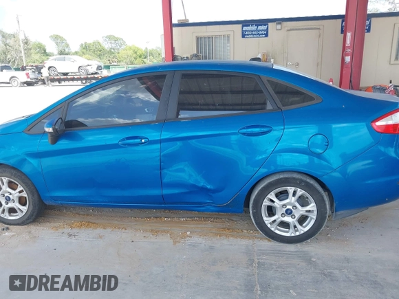 2015 Ford Fiesta SE with VIN 3FADP4BJ6FM139250, listed as a IAAI auction lot 42112935 with 163,752 mi miles. Bid and sale history available at carsss.com. Image 6.