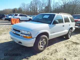 2002 Chevrolet Blazer LS z VIN 1GNDT13W32K146843, wystawiony jako IAAI lot #41497892 z przebiegiem 121 882 mil mil oraz . Historia ofert i sprzedaży dostępna na DreamBid. Obrazek 2.