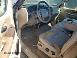 2000 Ford F-150 XL with VIN 1FTRX18L0YNB65908, listed as a Copart auction lot 54797585 with 298,924 mi miles and Clean title. Bid and sale history available at DreamBid. Image 8.