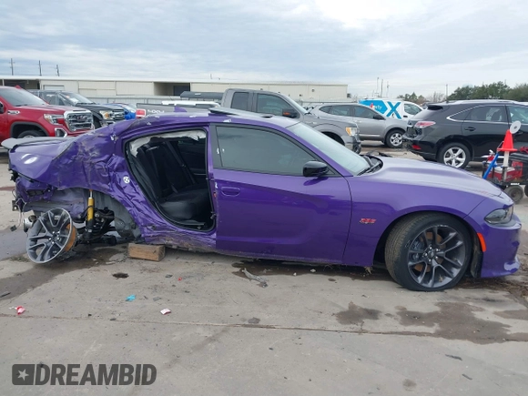 2023 Dodge Charger Scat Pack Widebody with VIN 2C3CDXGJ5PH699595, listed as a IAAI auction lot 41303894 with 1,828 mi miles and . Bid and sale history available at DreamBid. Image 14.