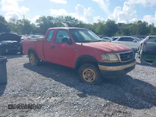 2001 Ford F-150 XL with VIN 1FTRX18W21NA89561, listed as a IAAI auction lot 42505859 with Not provided miles and . Bid and sale history available at DreamBid. Image 1.