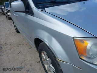 2010 Chrysler Town & Country Touring with VIN 2A4RR5D11AR308213, listed as a IAAI auction lot 41860649 with 196,072 mi miles. Bid and sale history available at carsss.com. Image 6.