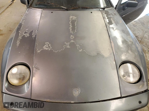 1984 Porsche 928 z VIN WP0JB0925ES861303, wystawiony jako Copart lot #41979575 z przebiegiem 114 593 mil mil oraz Nie do naprawy • Non repairable. Historia ofert i sprzedaży dostępna na DreamBid. Obrazek 11.