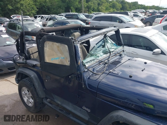 2006 Jeep Wrangler SE with VIN 1J4FA29156P739521, listed as a IAAI auction lot 42563566 with 117,281 mi miles and . Bid and sale history available at DreamBid. Image 6.