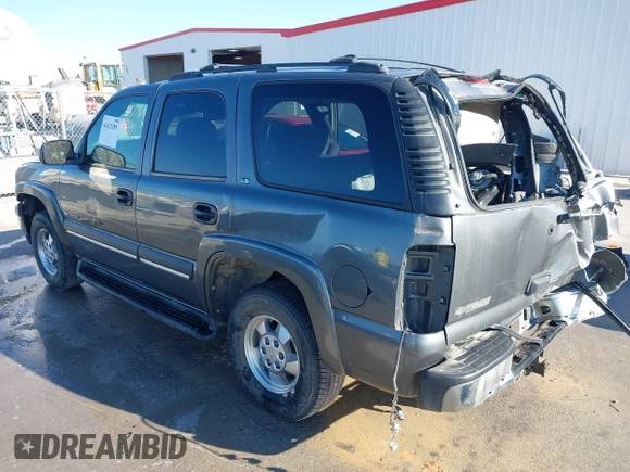 2002 Chevrolet Tahoe LT z VIN 1GNEC13Z42R319646, wystawiony jako IAAI lot #41623259 z przebiegiem 250 430 mil mil oraz . Historia ofert i sprzedaży dostępna na DreamBid. Obrazek 3.