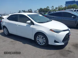 2018 Toyota Corolla L with VIN 5YFBURHE7JP810444, listed as a IAAI auction lot 42558647 with 74,794 mi miles and . Bid and sale history available at DreamBid. Image 1.