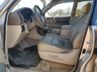1999 Toyota Land Cruiser z VIN JT3HT05J0X0039052, wystawiony jako Copart lot #54229355 z przebiegiem 228 216 mil mil oraz Czysty tytuł • Clean title. Historia ofert i sprzedaży dostępna na DreamBid. Obrazek 7.