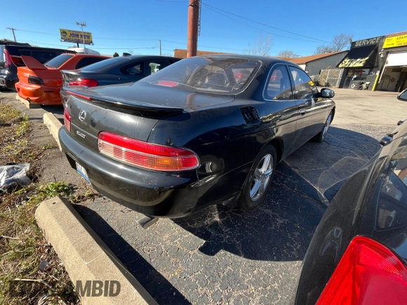 1995 Lexus SC 400 z VIN JT8UZ30CXS0041496, wystawiony jako Copart lot #80837114 z przebiegiem 62 010 mil mil oraz Tytuł czysty. Historia ofert i sprzedaży dostępna na DreamBid. Obrazek 4.