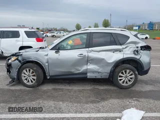2014 Mazda CX-5 Touring with VIN JM3KE4CY1E0426409, listed as a IAAI auction lot 41924258 with 116,956 mi miles. Bid and sale history available at carsss.com. Image 6.